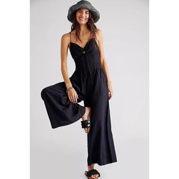 NWT FREE PEOPLE DAY GLOW ONE PIECE IN BLACK - Picture 1 of 4